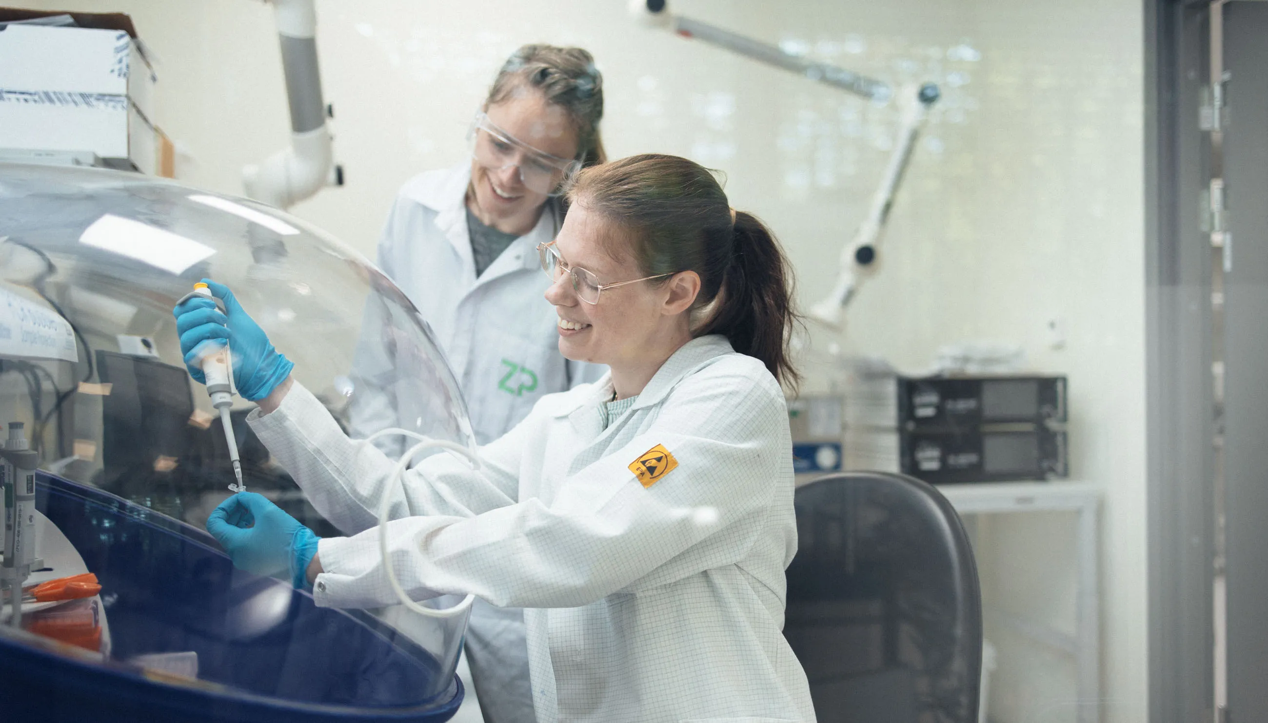 Researcher in a fume hood — ZP contract research laboratory